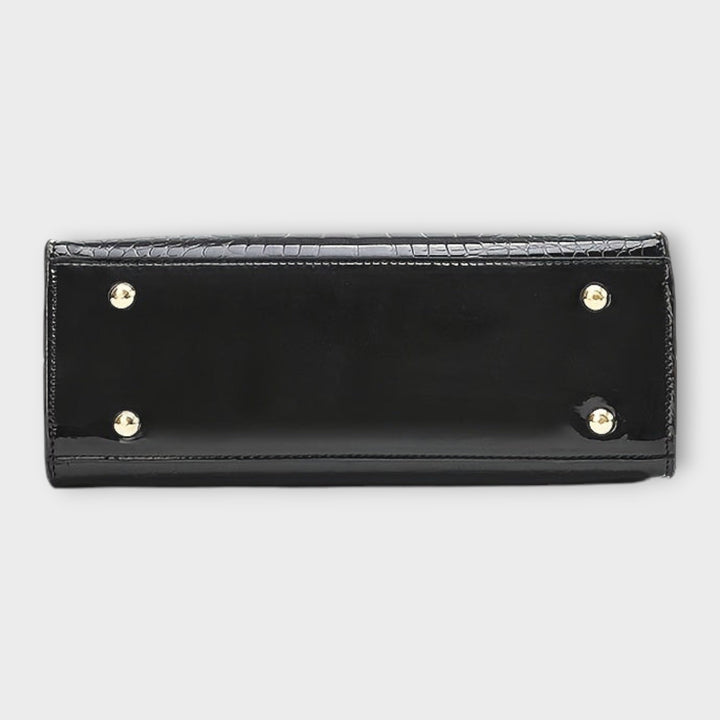 תיק יד מבריק בדוגמת עור תנין של לורה